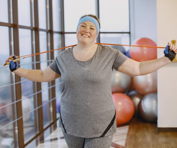Happy woman exercising after Bariatric Surgery
